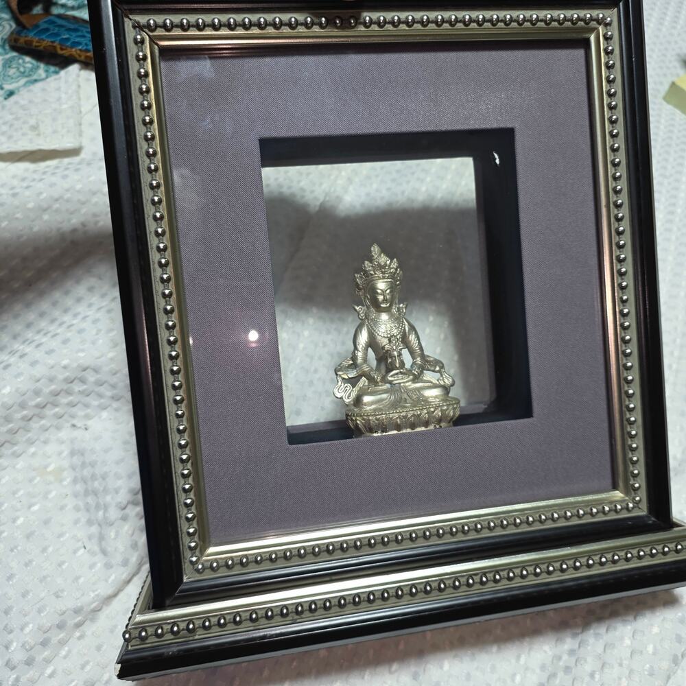 METAL BUDDHA DICIPLE MOUNTED IN SHADOW BOX HEAVY DUTY